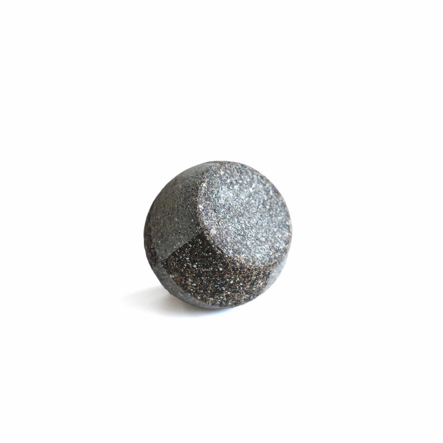 Bottom view of Gen’en round base bud vase highlighting its sculpted rounded base and natural clay finish