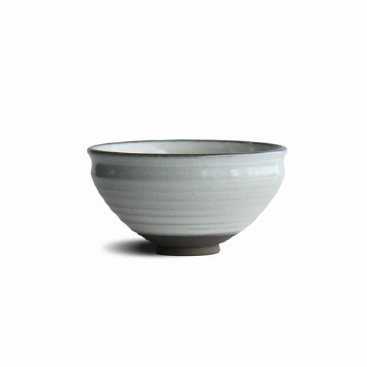 Hakuei white matcha bowl by Shinko Kiln with soft ivory glaze and gently rounded silhouette