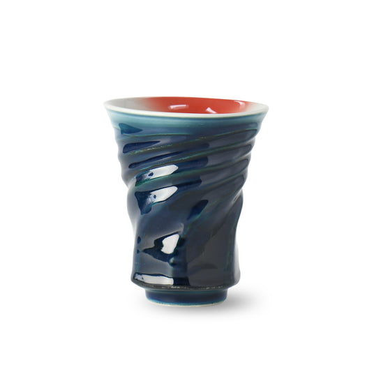 Back view of Yūkei, collaborative Japanese vase with dynamic swirling glaze in deep blue and coral tones, handcrafted by Ikeda and Takenishi.