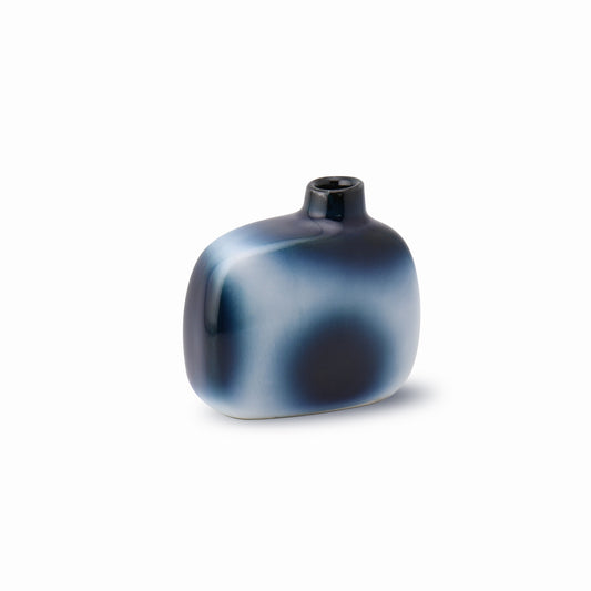 The front view is of the compact rectangular form Japanese bud vase in misty blue moonshadow glaze. Handcrafted by Yoshito Takenishi