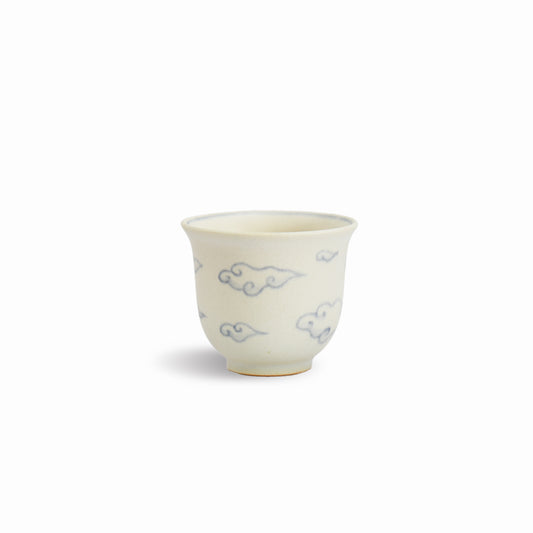 Handmade Japanese teacup by Fumiyama with matte glaze and blue cloud motif