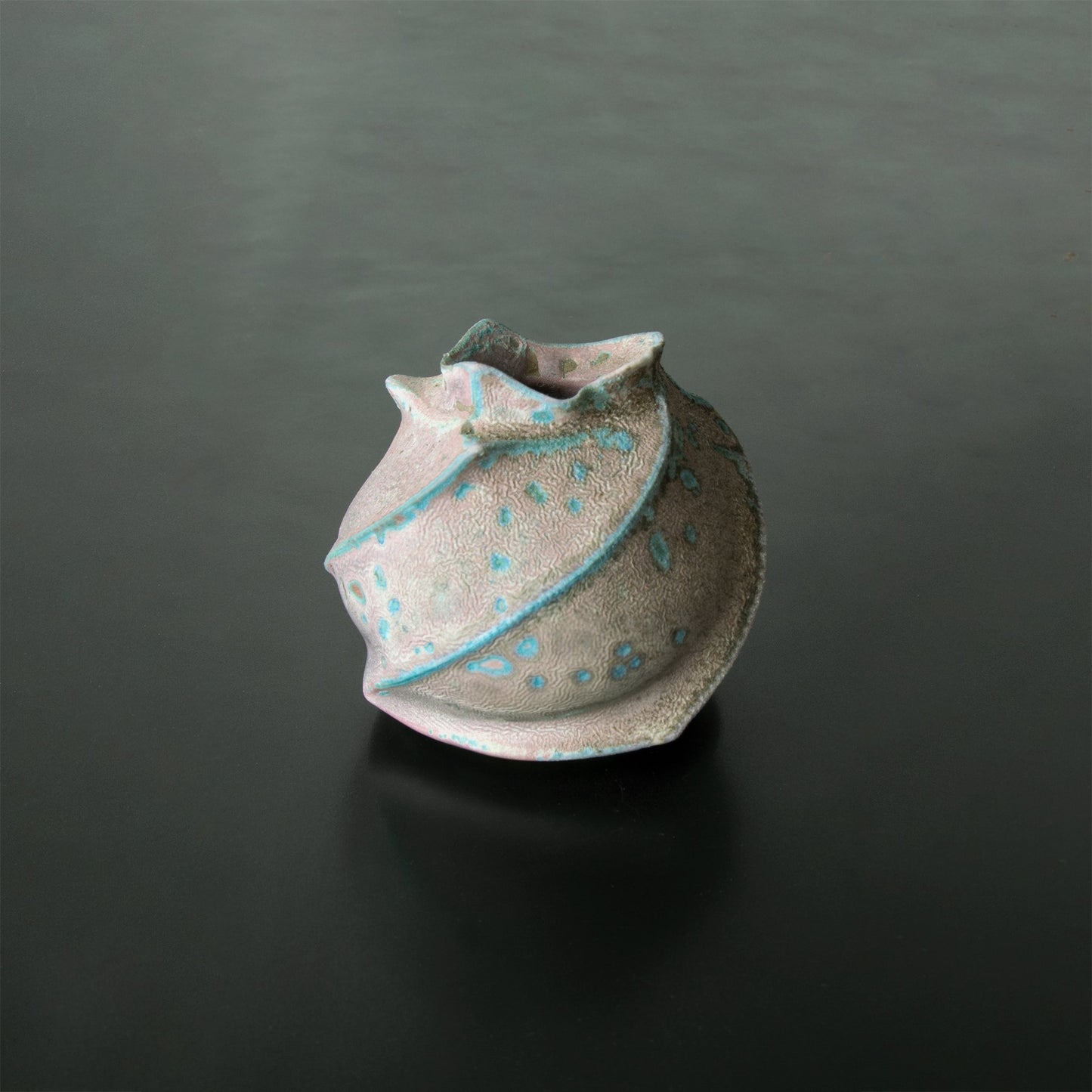 Handmade Anagama Kinyo 4 Japanese bud vase features raised blue-green spiraling ribs undulating opening at the top. stunning bud vase.