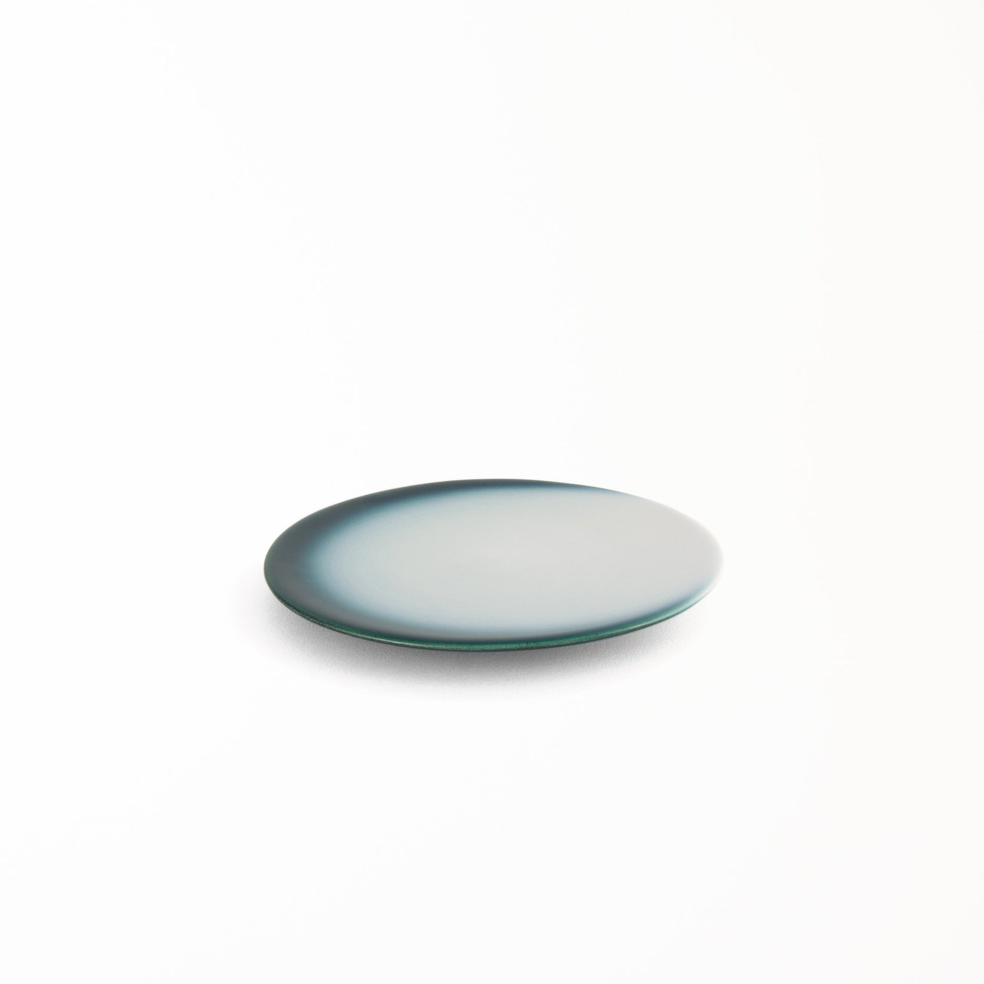 Shallow white dessert plate Joshua Blue Premium with deep blue moon shaped crescent