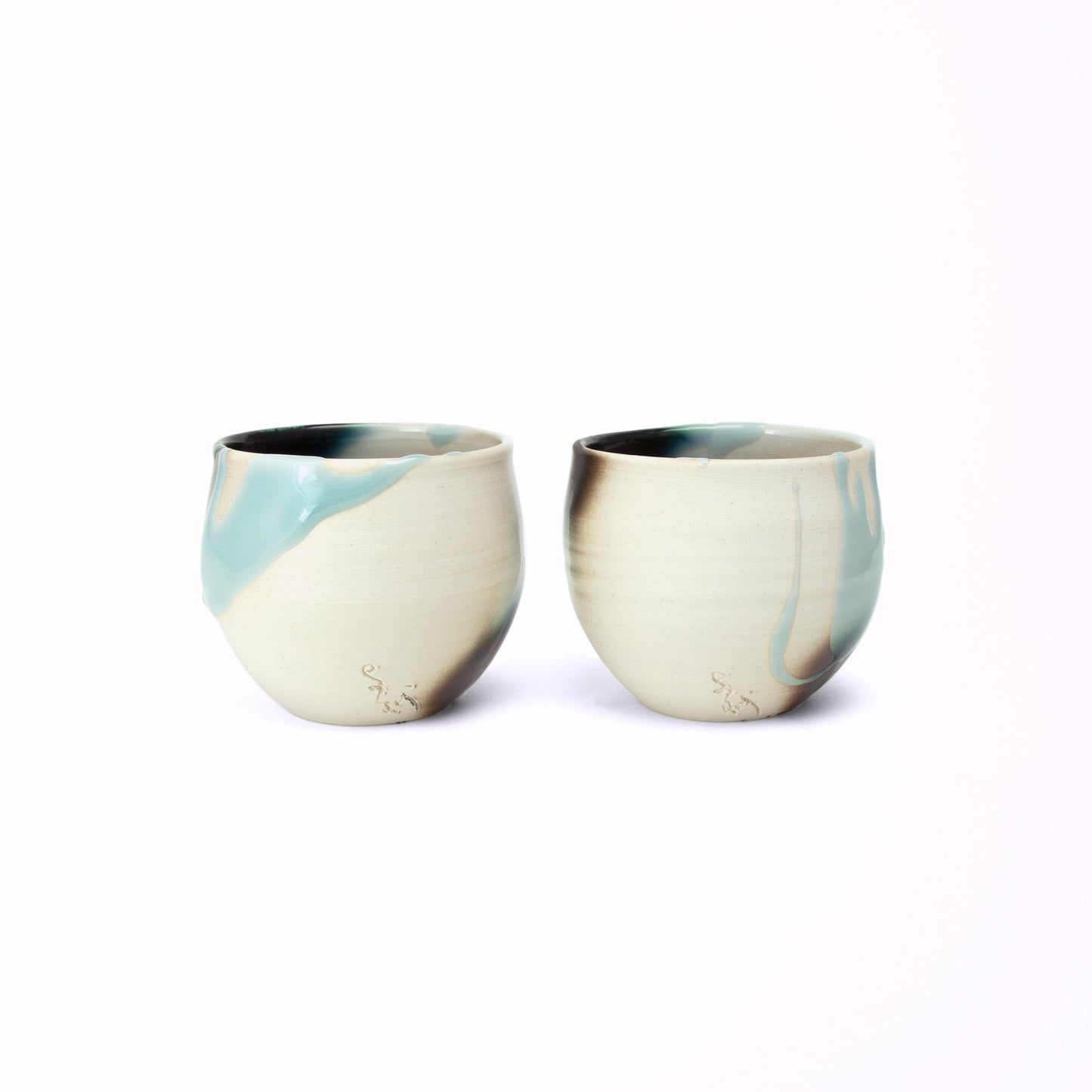 Two cup Japan tea set Kage-Ao Takenishi’s etched signature on the lower side near the base. The blue glaze looks like dripping and Takenishi made it possible with lots of trials and errors.