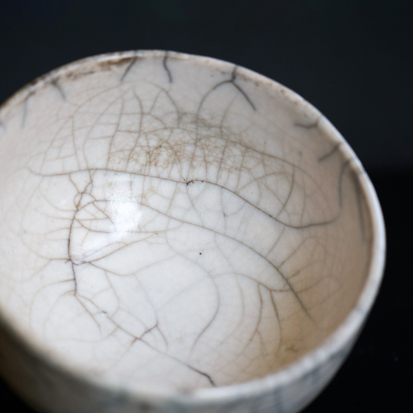 Close look of the isnide of the bowl.  Please note that due to the nature of the "kannyu" technique, over time, the colors of food and drink may seep into the porous glaze material.