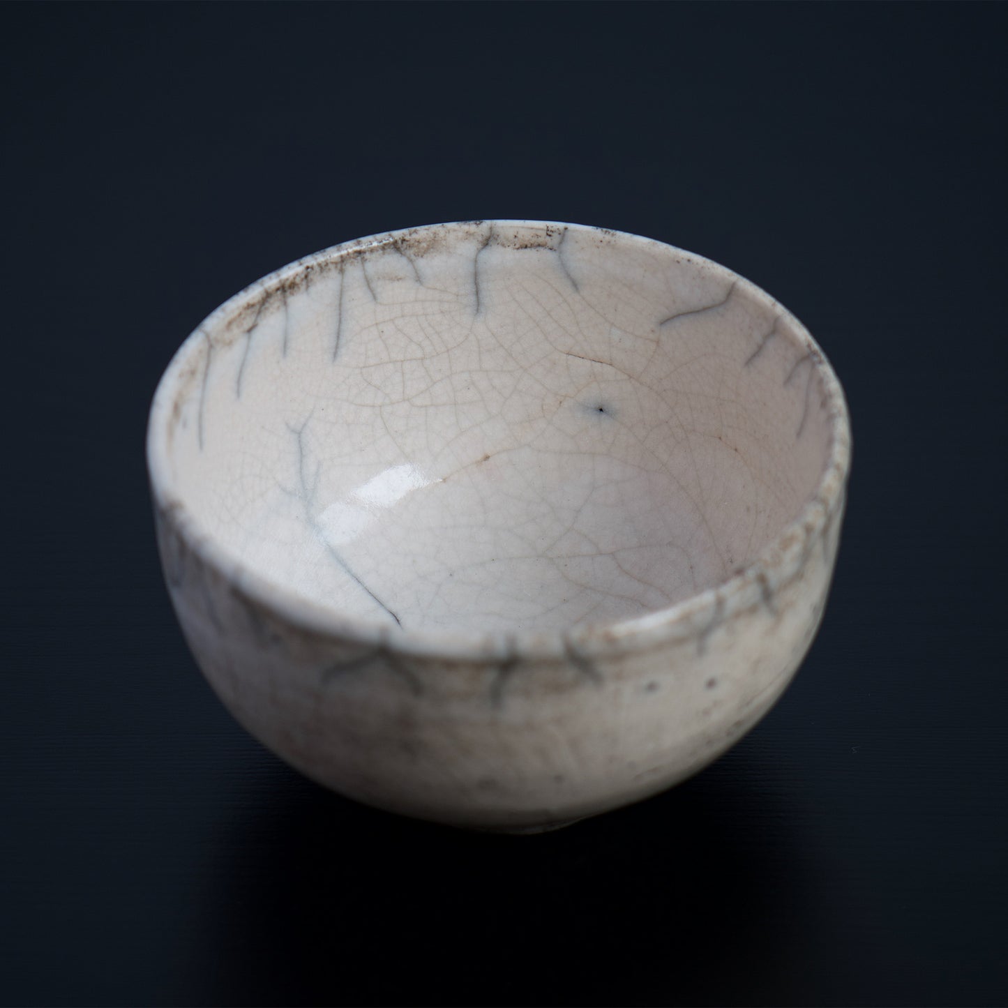 Inside of the bowl view. The minimal yet elegant and modern crockery showcases the wabi sabi aesthetic, creating a rare and distinctive piece of art from every angle.