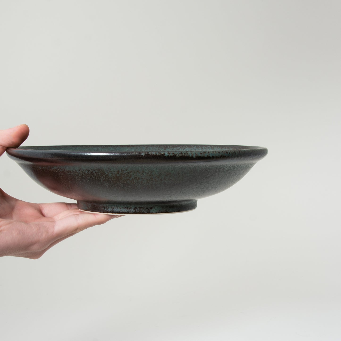Koku pasta dish with matte grey and semi-gloss black mottled glaze