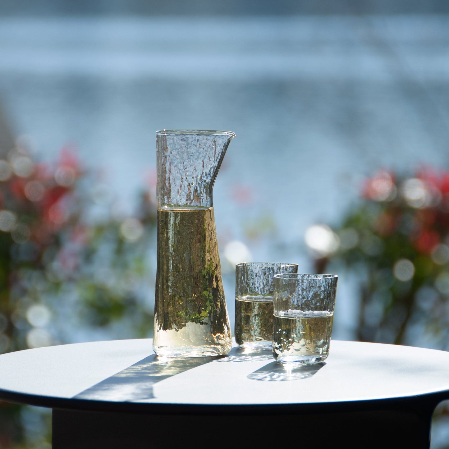 Two sake cups with unique shape carafe modern glassware