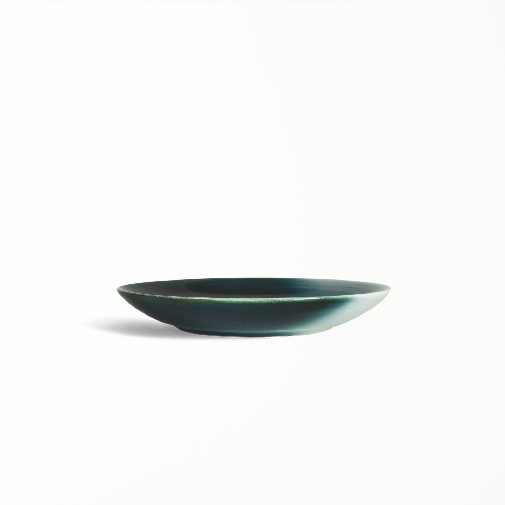 Seto Blue Japanese modern dinner plate glossy white glaze spilling over the rim diffusing to a deep blue