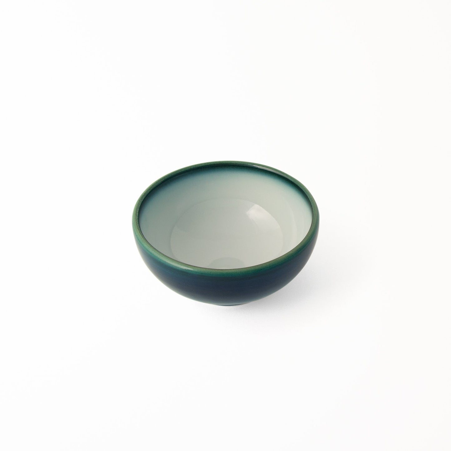 Ceramic bowl artisan-made in Japan Shima White glossy white glaze inside bordered with deep blue glaze hint of green at rim