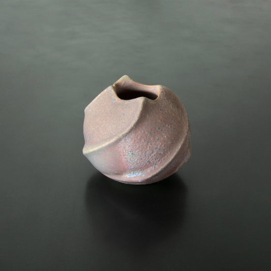 Handcrafted vase made in Japan Anagama Kinyo 5 raised spirals terminating at the top tulip shaped opening. one-of-a-kind flower vase.