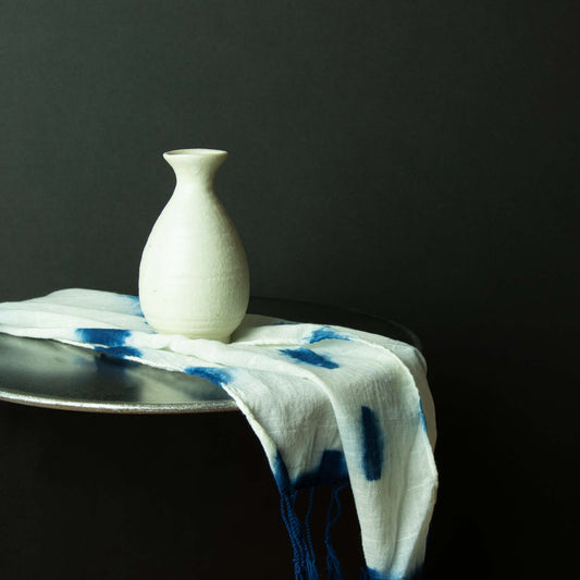 Off-white textured sake container