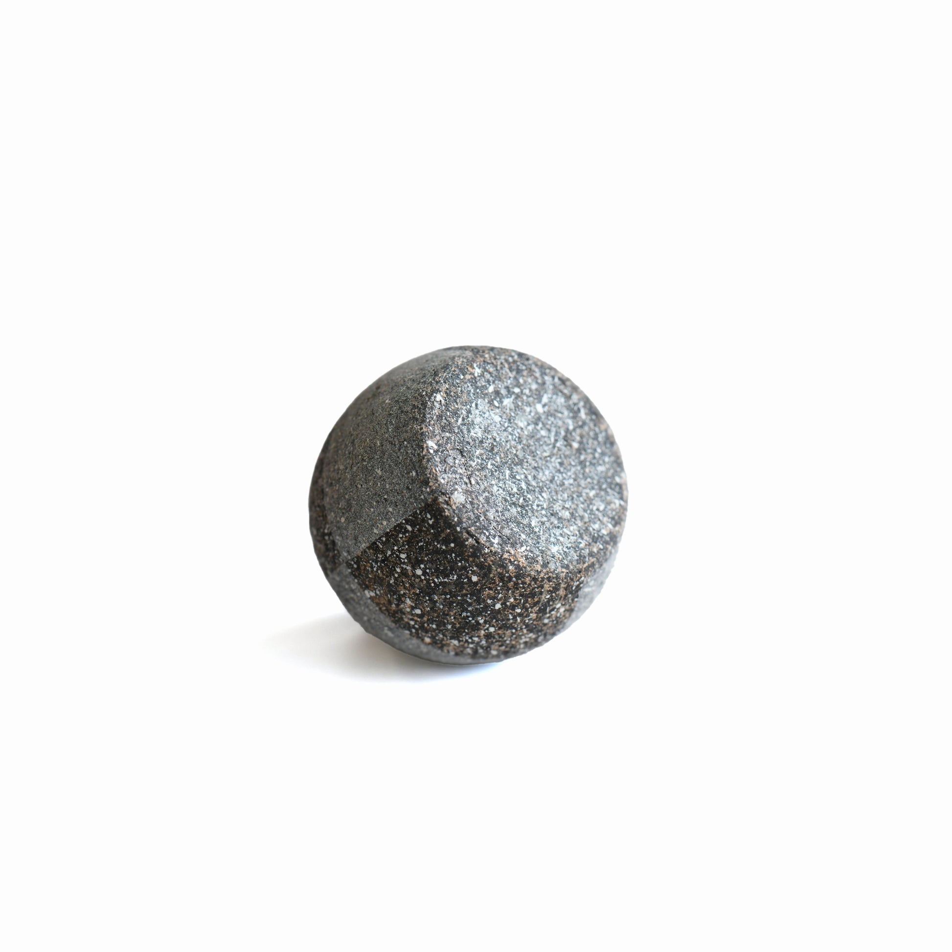 Bottom view of Gen’en round base bud vase highlighting its sculpted rounded base and natural clay finish