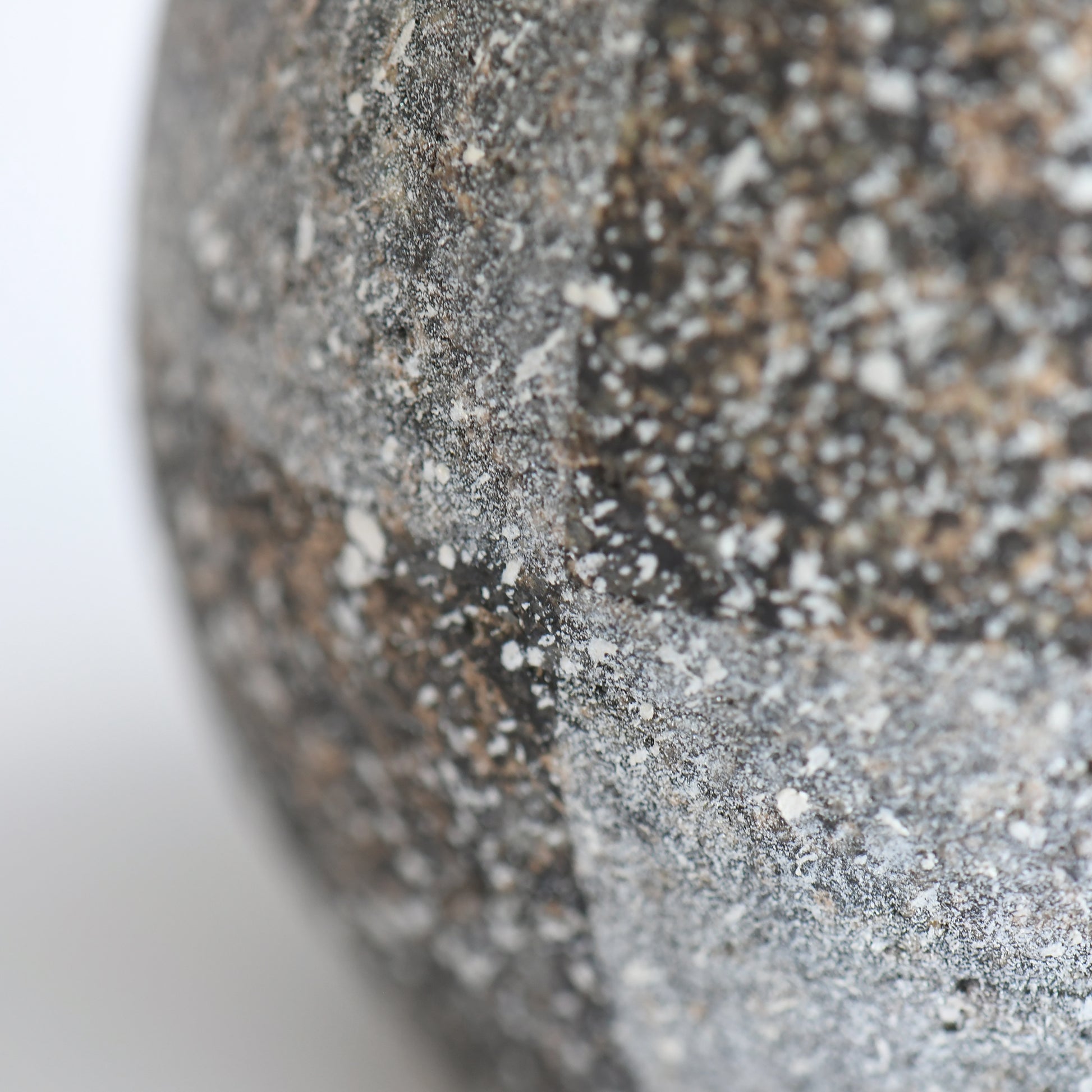 Close-up detail of Gen’en vase showing rough, speckled ceramic texture and tonal contrast