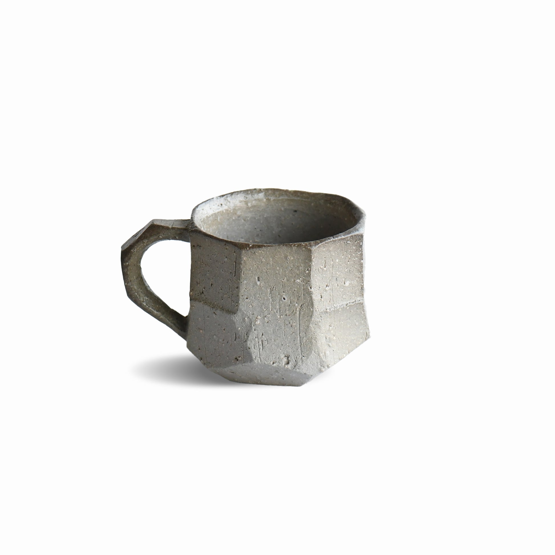 Back view of Japanese stoneware espresso mug with angular handle, Sehitsu series by Manabu Suehiro.