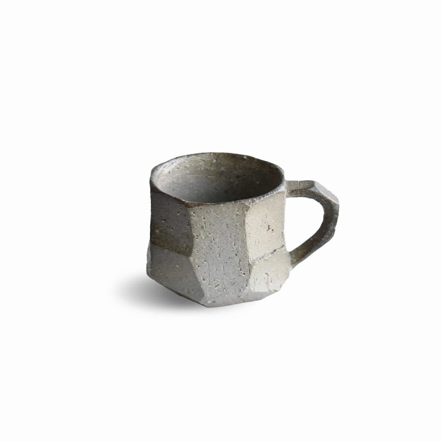 Sehitsu Mug Small #1 by Manabu Suehiro, handcrafted Japanese ceramic espresso mug in textured grey stoneware.