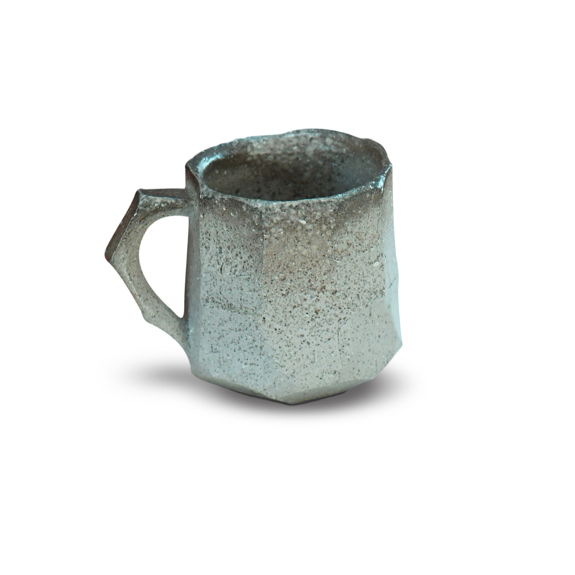 Angular stoneware mug inspired by ancient Japanese Sueki, created by Bizen master Manabu Suehiro.