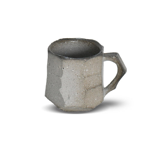 Handcrafted gray Sueki-style mug by Manabu Suehiro with faceted form and rustic texture.