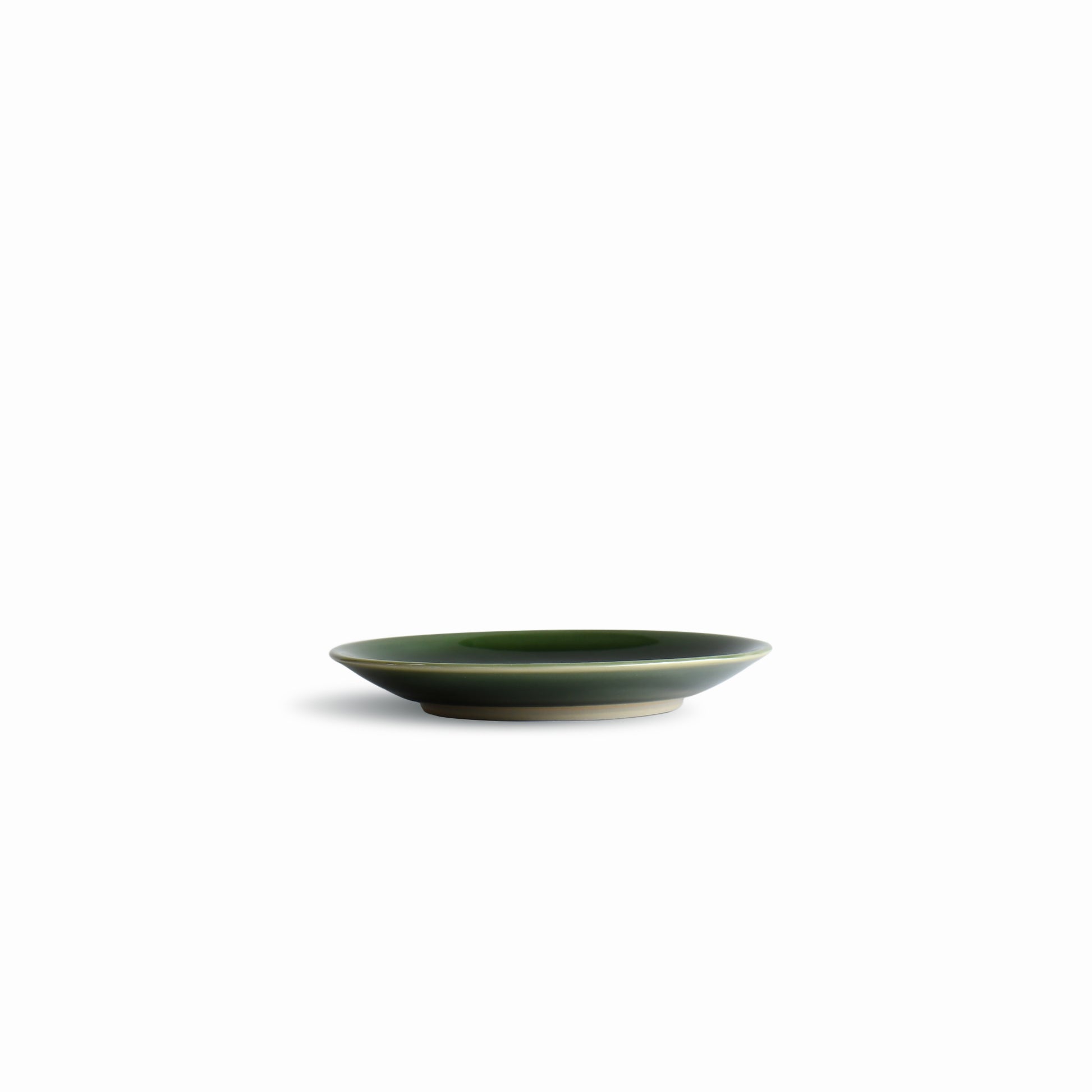 Side profile of the Suiran handcrafted Japanese salad plate in deep green glaze