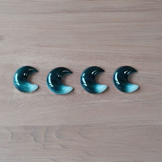Set of four crescent-moon chopstick rests in a blue-to-white gradient handcrafted by Yoshito Takenishi.