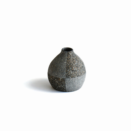 Gen’en round base bud vase by Yasuhiro Itoi in textured charcoal and gray ceramic with divided tonal surface