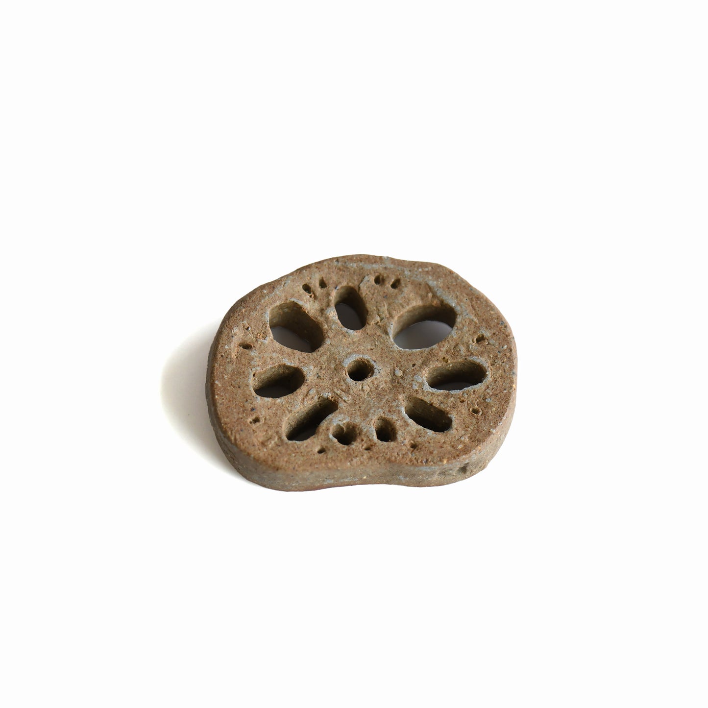 Back view of the handmade Bizen lotus root chopstick rest by Masato Miura