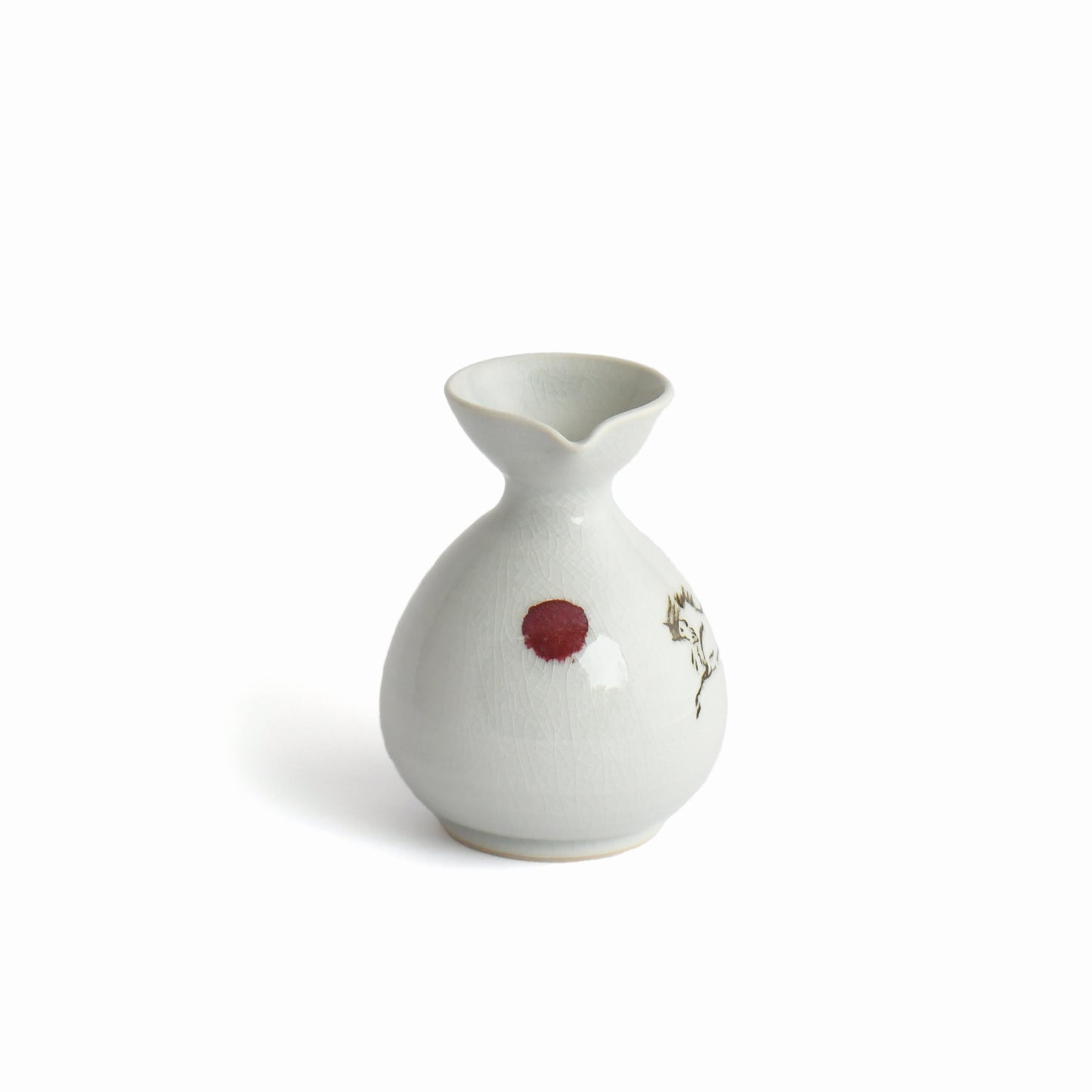 Side view of Shunme white sake carafe highlighting elegant curved form.