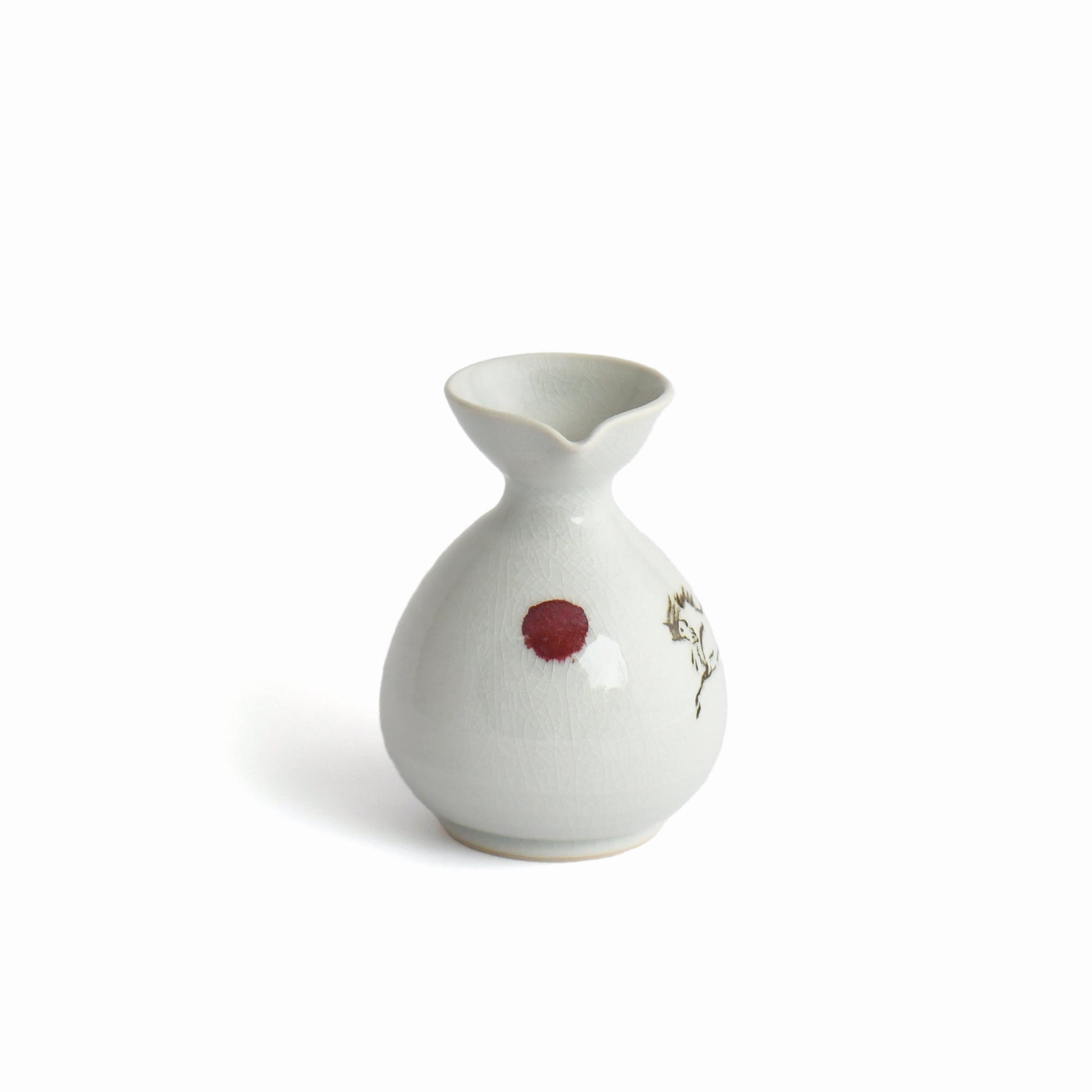 Side view of Shunme white sake carafe highlighting elegant curved form.