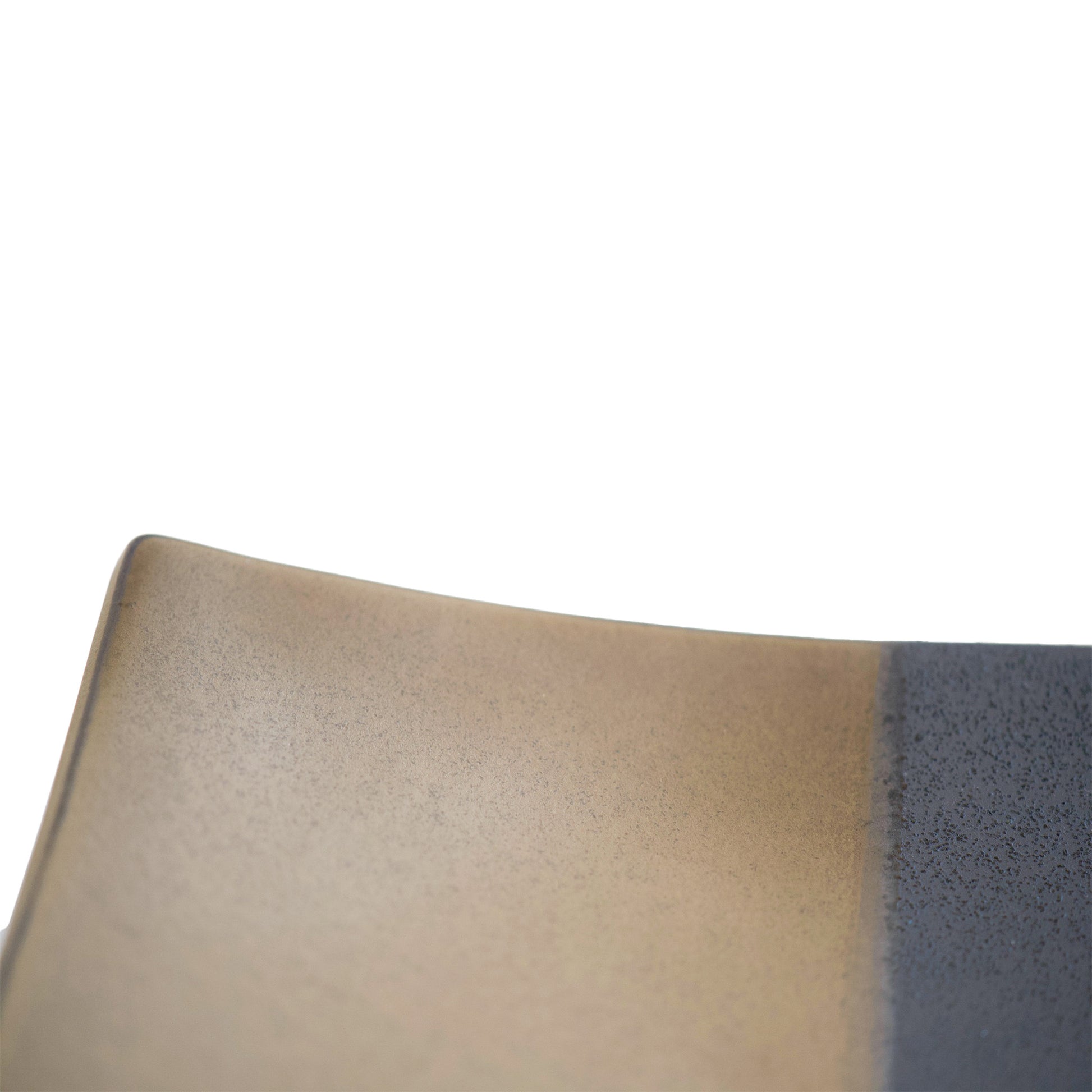 Close up of the corner of the plate. Carefully finished and smooth surface.