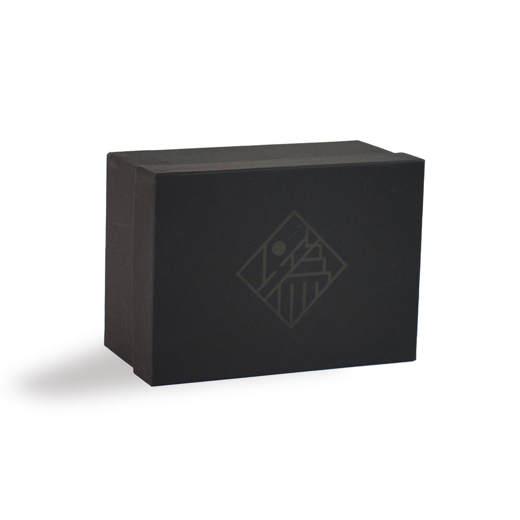 he front view of a beautiful black box containing the sake set. Beautiful logo on the top. Japanese tableware. Made in Japan.
