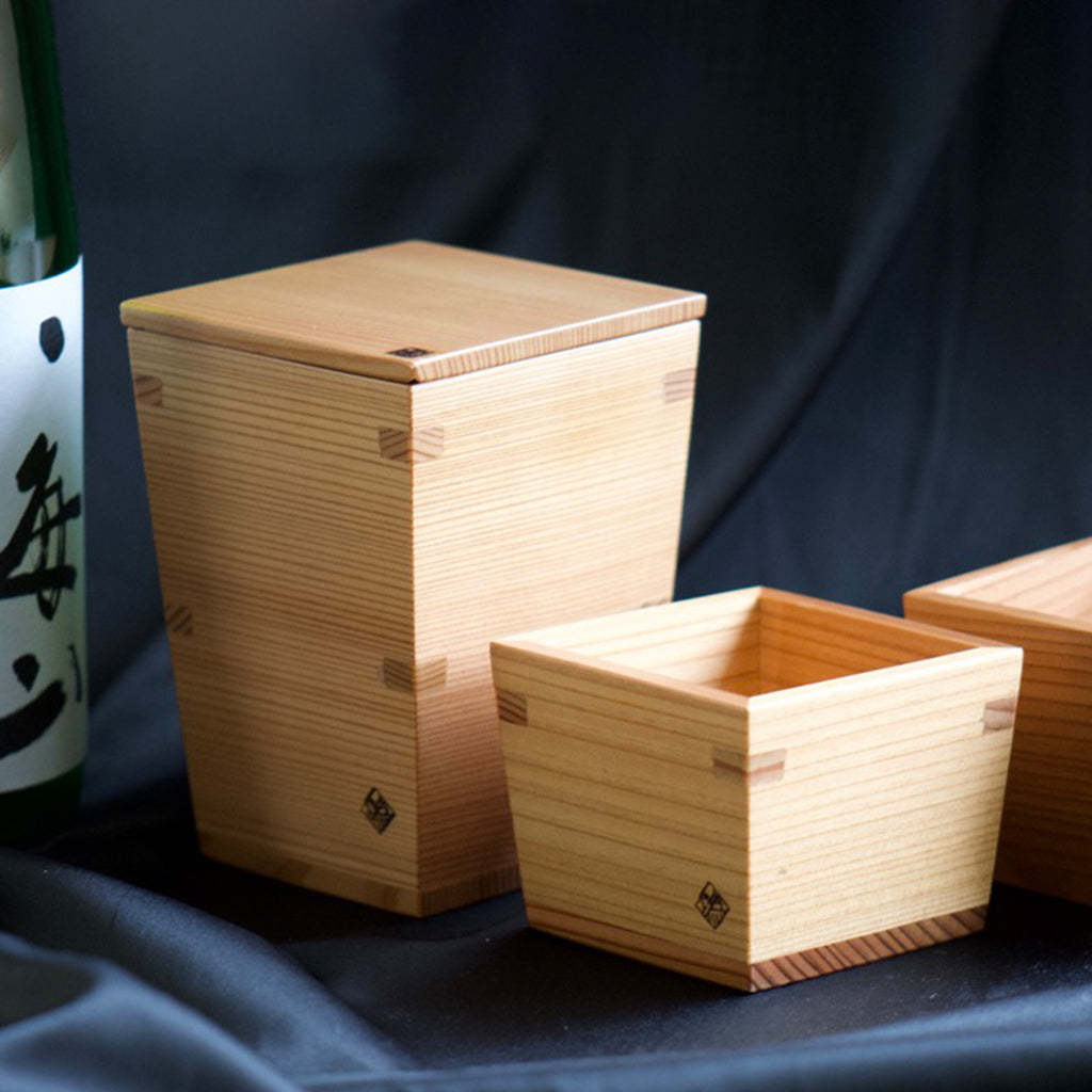 A set of sake carafe and cup with Japanese sake bottle, perfect for special occasions.