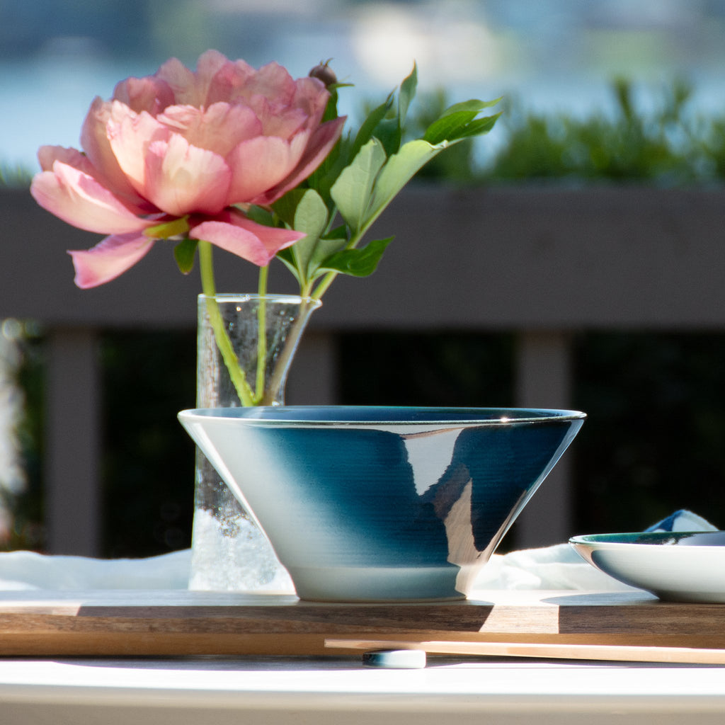 V-shaped ramen bowl blue white table setting