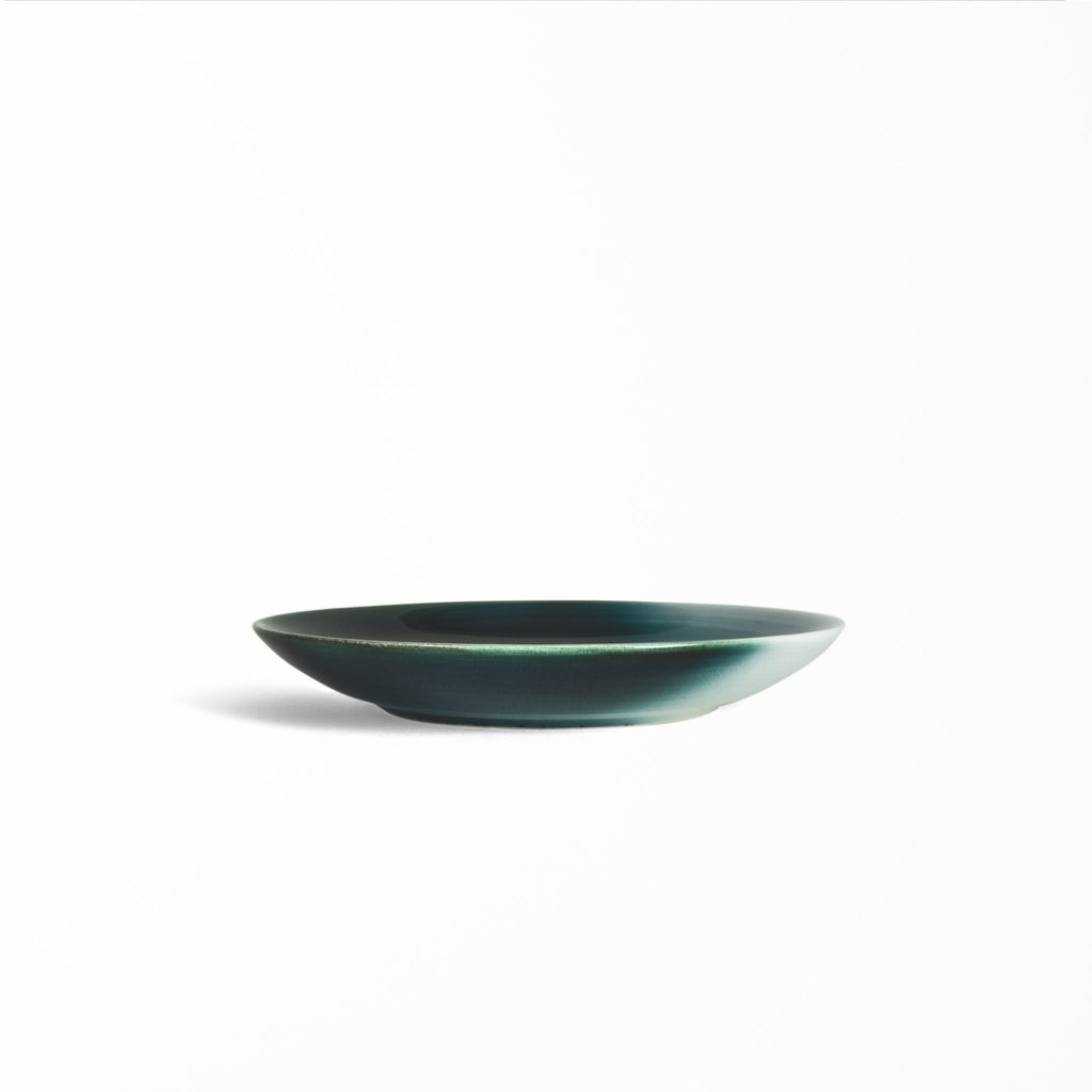 Contemporary salad plate Japan made Seto Blue glazed white on one side diffusing to deep blue