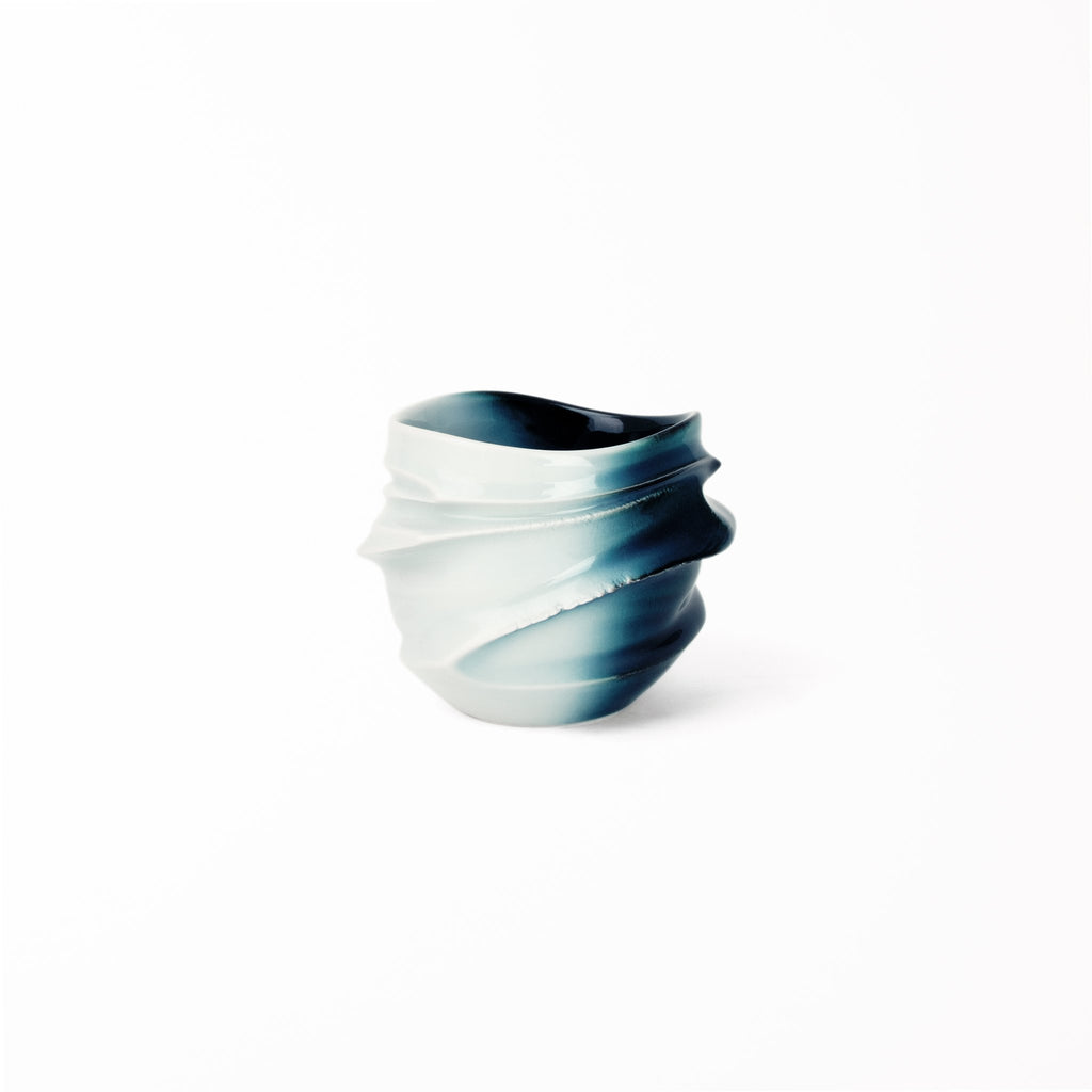 Japanese sake cup collaboration Suiroku Ikeda’s organic design with Takenishi’s signature blue and white glaze