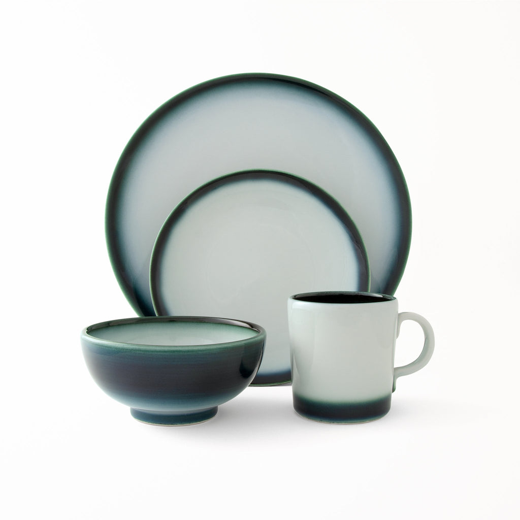 All occasion dishware made in Japan Shima White 4 piece modern style glossy white glaze deep blue accents