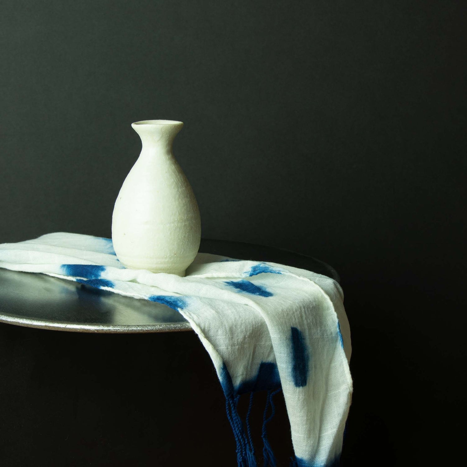 Off-white textured sake container 